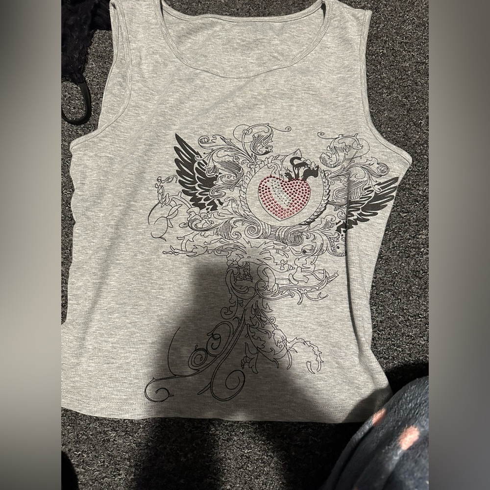 Light grey tank top with design made out of rhinestones , size large